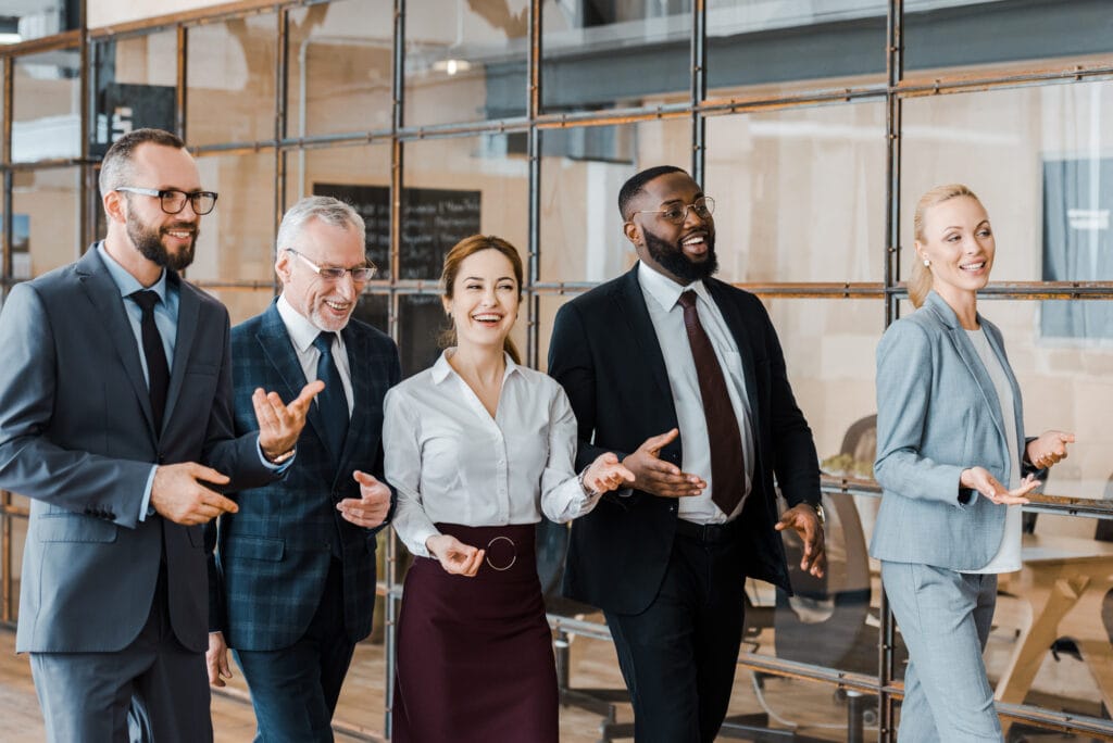 Group of business people laughing